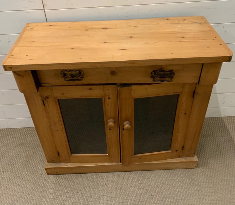 A pine side cupboard with glazed double doors (H82cm W89cm D37cm) - Image 2 of 3