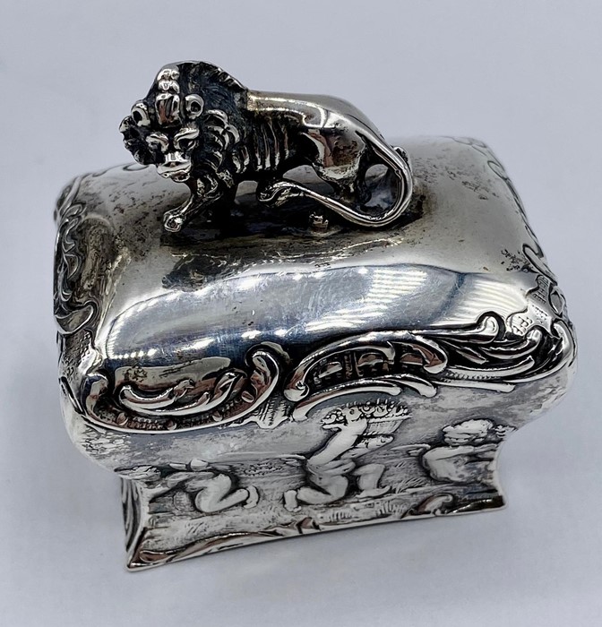 A silver tea caddy with repousse design and lion finial by Samuel Boyce, hallmarked for Chester 1903 - Image 4 of 6