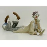 A large Lladro porcelain figure of a clown with ball L26N