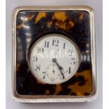 A Charles & Richard Comyns silver and tortoiseshell oversized travel watch and stand AF (11cm x