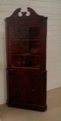 A mahogany corner cabinet (H192cm W82cm D57cm)