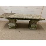 A garden cast stone/concrete bench with scroll ends AF