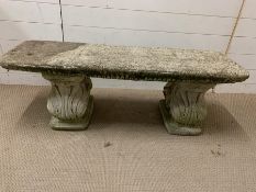 A garden cast stone/concrete bench with scroll ends AF