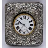 A Travel watch on silver easel frame by Henry Clifford Davis, hallmarked Birmingham 1907. (11cm x