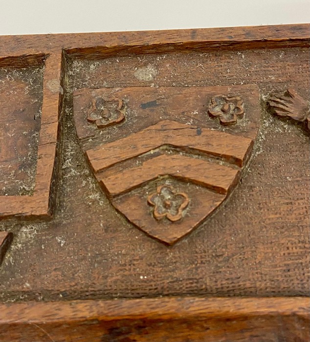 A small antique carved wooden desktop marked 1387 with an unknown coat of arms - Image 2 of 4