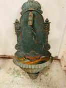 A Metal decorative wall mounted garden fountain.