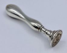 A silver monogrammed stamp, hallmark for Birmingham by H J Cooper & Co Ltd (10cm tall)