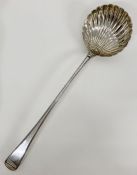 A George Smith (III) shell ladle, hallmarked for London 1777 (35 cm Long)