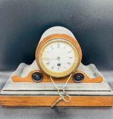 A wooden mantle clock