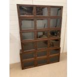 A six section bookcase in the style of Globe Wernicke. (H27cm W123cm D23cm)