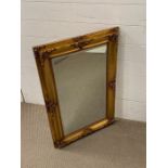A gilt frame wall mirror (57cm x 86cm)