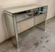 A mirrored console table (H76cm W100cm D36cm)