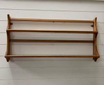An Ercol wall hanging teak rack (H50cm W94cm D15cm)