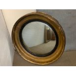 A gilt framed convex mirror (Dia67cm)