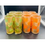 Twelve vintage tumbler glasses, orange, green glass with gilt decoration