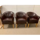 Three brown leather club or tub chairs (W60m x D60cm x H82cm)