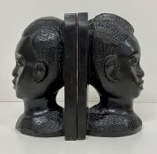 Two African themed wooden bookends