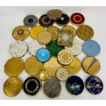 A large selection of collectable compacts, various makers and designs.
