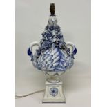 A Blue and White Italian lamp base in the figure of two swans with flowers. (H58cm)Condition