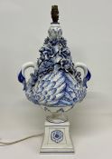 A Blue and White Italian lamp base in the figure of two swans with flowers. (H58cm)Condition