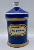 A vintage "Mel Boracis" apothecary jar