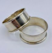 A pair of silver napkin rings (31g) hallmarked for Birmingham 1992, by Swatkins Group Ltd