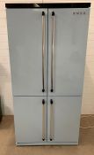 A Smeg two door refrigerator and freezer (H187cm W93cm D68cm)