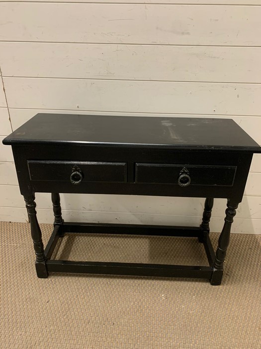 A small side table with drawers to base (H60cm W80cm D30cm)