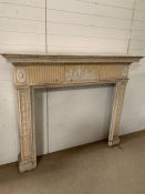 An Early 19th Century Adams style chimney piece with central plaque of classical design (142 cm H