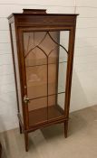 A glazed string inlay display cabinet on straight legs (H157cm W60cm D32cm)