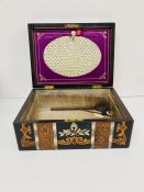 A Japanese and Mother of Pearl sewing box with inlay scrolling to top and front. a silk fall front