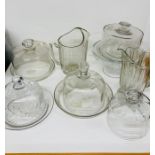 A selection of glassware to include covered dishes and jugs.