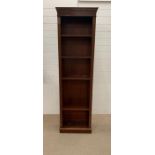 A shelving unit. (H197cm W58cm D28cm)