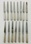 A set of fifteen small silver handled knifes