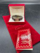 A Vintage Must de Cartier Tank watch in original box with brown strap, paperwork confirming