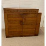 An Art Deco Walnut sideboard (H100cm W123cm D49cm)