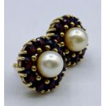 A Pair of 18ct gold earrings with central pearl and ruby style stones.(5.3g)