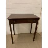 A mahogany hall table on tapering legs (H74cm W65cm D39cm)