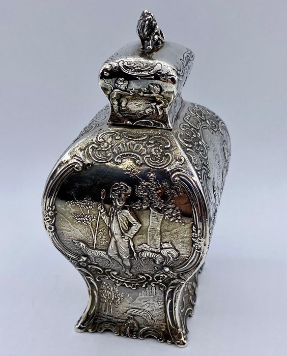 A silver tea caddy with repousse design and lion finial by Samuel Boyce, hallmarked for Chester 1903 - Image 3 of 6