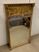 A Regency style giltwood mirror flanked by reeded column with acanthus capitals (70cm x 118cm)