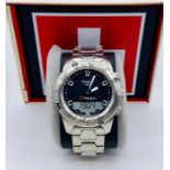 A Tissot T Touch II stainless steel T 047 420 11 05100 watch, boxed with manual