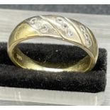 A gold ring marked 585 and with a total weight of 4.9g