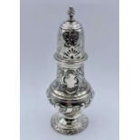 A Hallmarked silver sugar shaker approx 20 cm high, 194 g Hallmarked for London 1894 by Henry