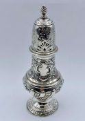 A Hallmarked silver sugar shaker approx 20 cm high, 194 g Hallmarked for London 1894 by Henry