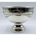 A Hallmarked silver bowl with the figure of a greyhound chased to top rim, 1967 541g total weight