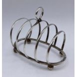 A silver toast rack by George Unite & Sons, hallmarked Chester 1914 (9.5cm x 8cm)