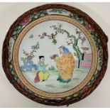 An oriental themed painted bowl, with a wicker decoration to edge AF