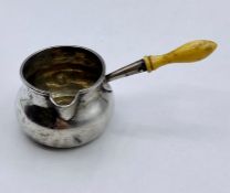 A small Victorian silver measure with ivory handle by Arthur Sibley, hallmarked for London 1866 (Dia