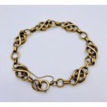 A 9ct gold bracelet with safety chain (16.3g)