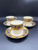 Christopher Dresser for Minton 3 Teacups with Saucers decorated with Blue Glazed flying Cranes in